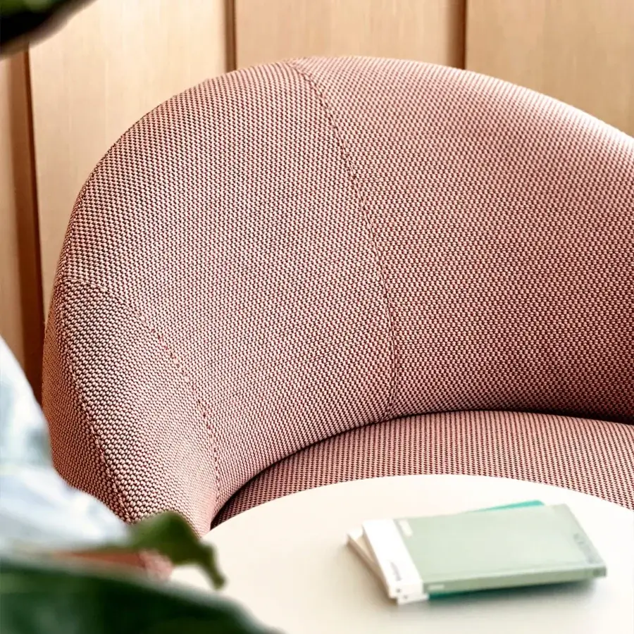 Exceptional Lapalma Kipu Club lounge chair with ergonomic backrest upholstered in textured rose textile