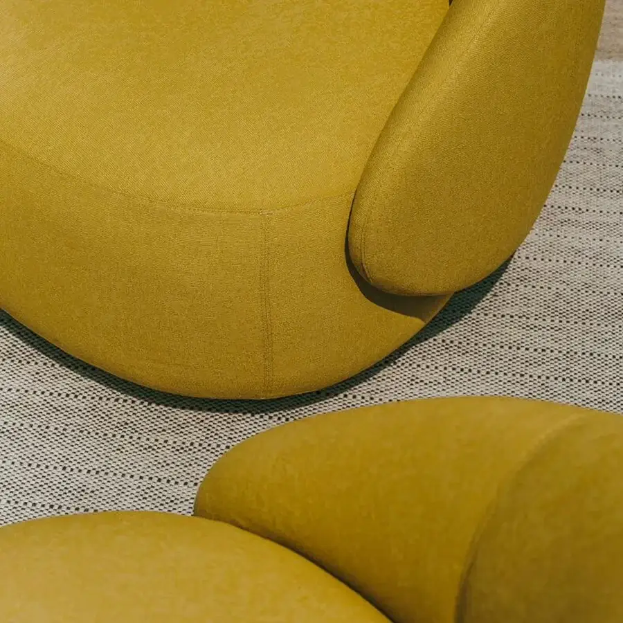 Distinguished Lapalma Kipu Club lounge chair with textured textile upholstery and ergonomic backrest in golden-yellow