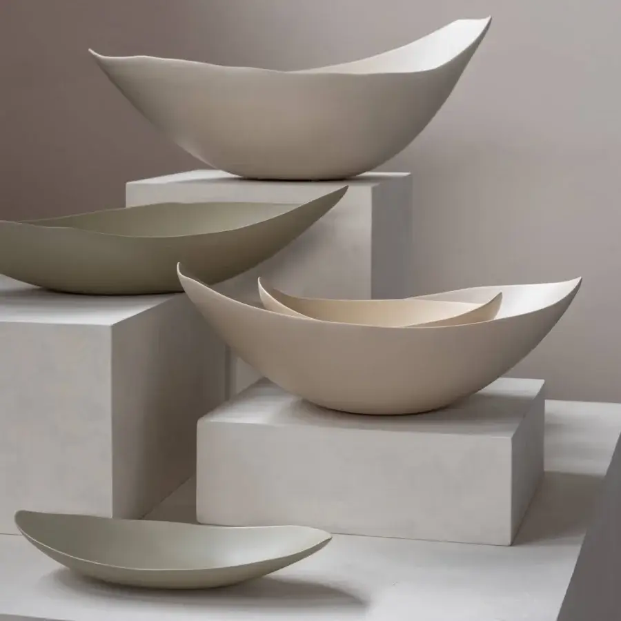 Exceptional Rina Menardi Barchette centerpiece crafted from baked clay with gently rising sides and matte off-white finish