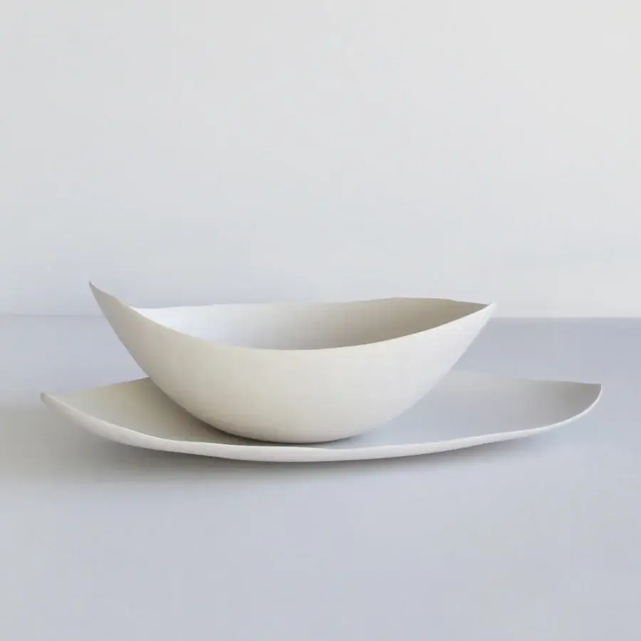 Exceptional Rina Menardi Barchette centerpiece crafted in Italy from baked clay with a smooth matte finish