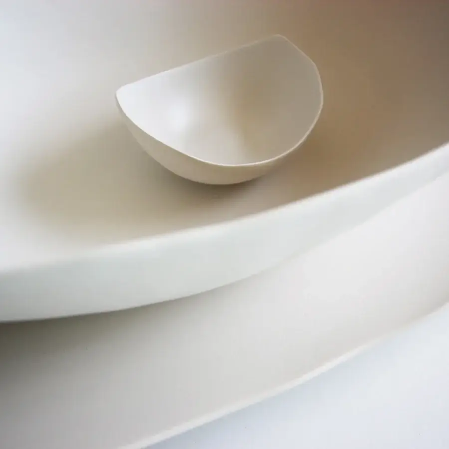 Distinguished Rina Menardi Barchette centerpiece crafted in baked clay with a smooth matte white finish