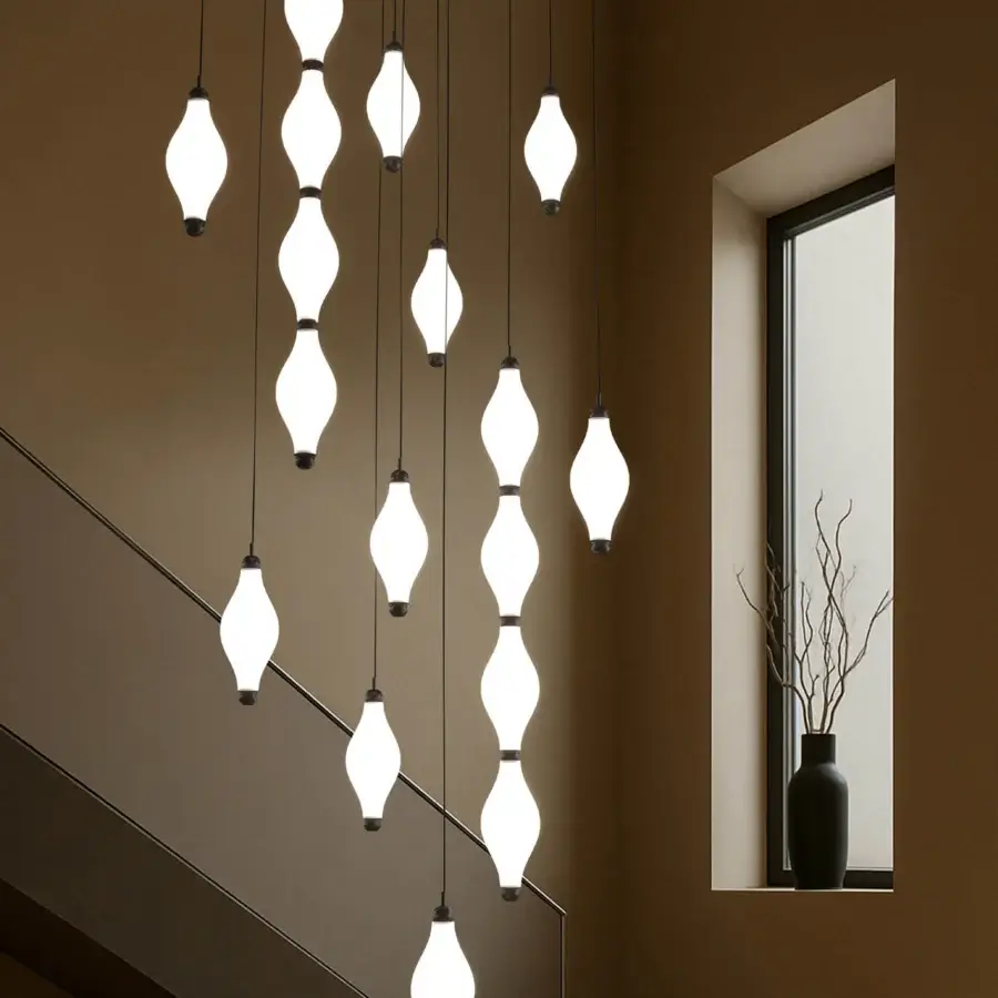 Elegant Euroluce Dewy suspension lamp in translucent white glass with dark matte metal finish and continuous neonflex within