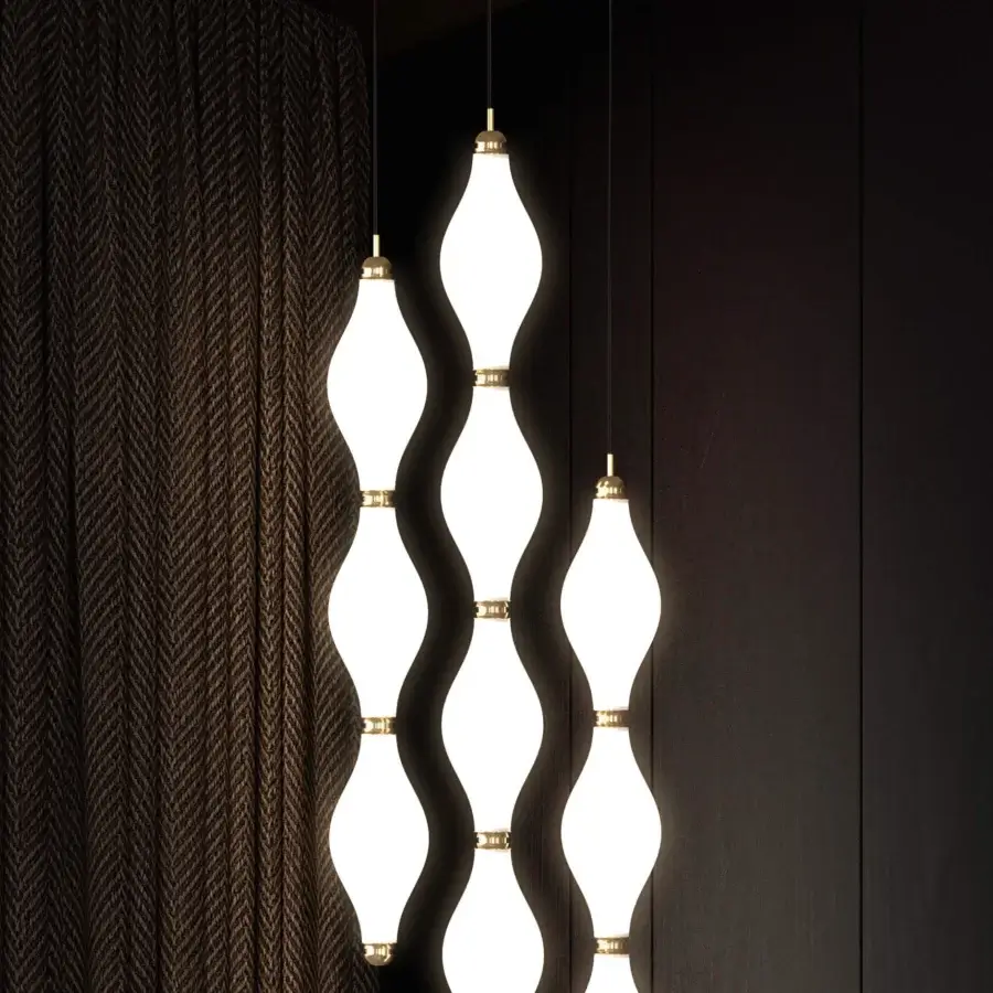 Superior Euroluce Dewy suspension lamp with translucent white shade and dark metal suspension cords in smooth matte finish