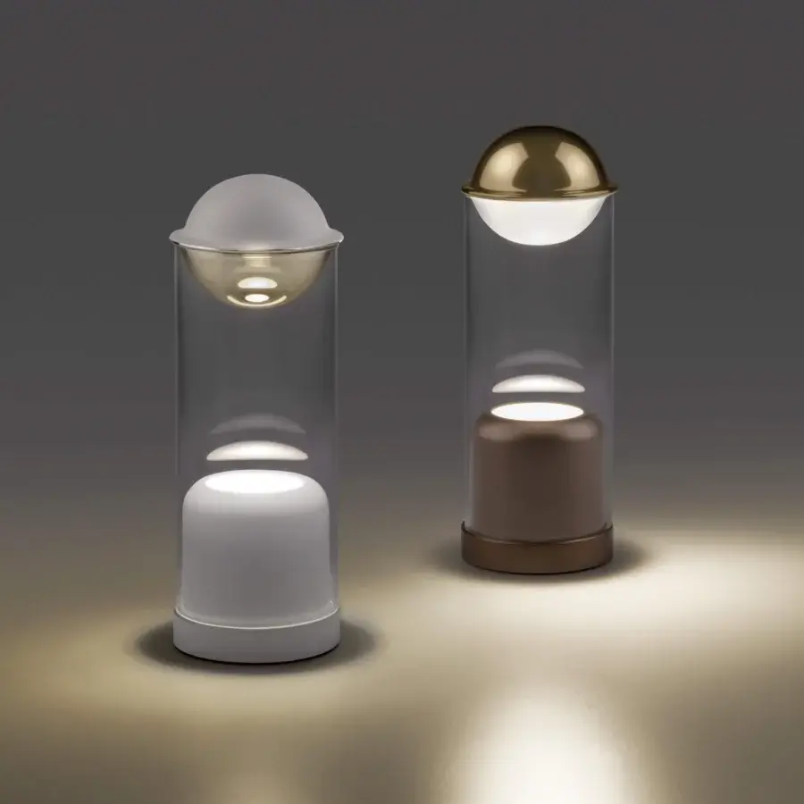 Exceptional Euroluce Theorem table lamp with a two-tone borosilicate sphere in glossy golden and satin finishes