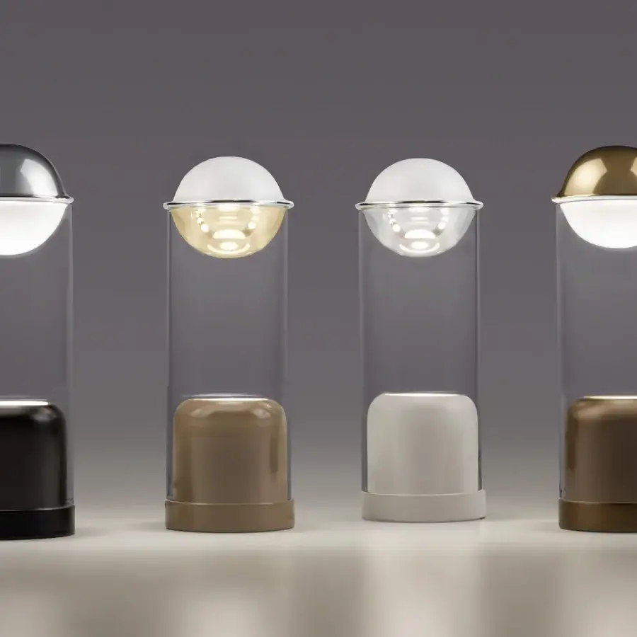 Superior Euroluce Theorem table lamp with a black base and dark gray two-tone borosilicate sphere crafted for redirected illumination