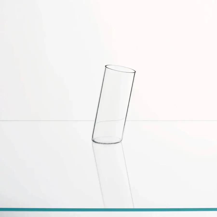Captivating Glas Italia Bow vase crafted in transparent borosilicate glass with a glossy finish and sculptural inclination