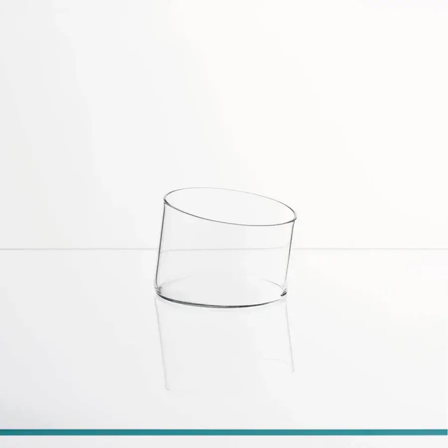 Distinguished Glas Italia Bow vase crafted in transparent borosilicate glass with a slender cylindrical form and clear finish