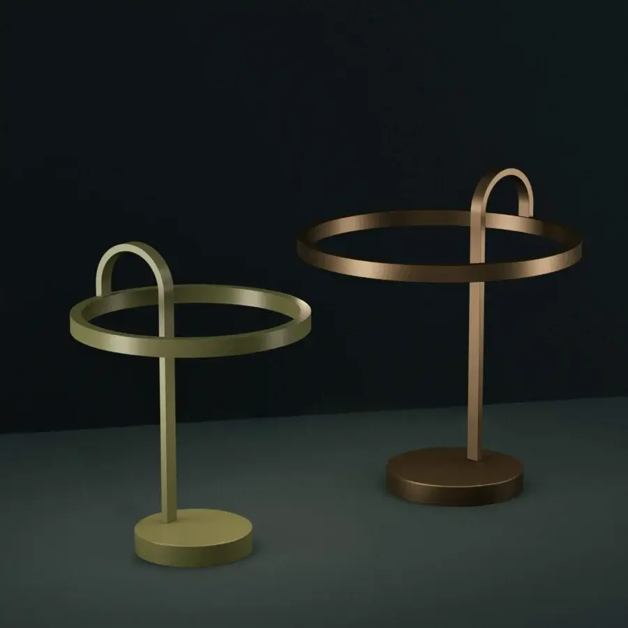 Captivating Euroluce Nido table lamp with curved silhouette in satin golden-yellow metal and dynamic white LED strip