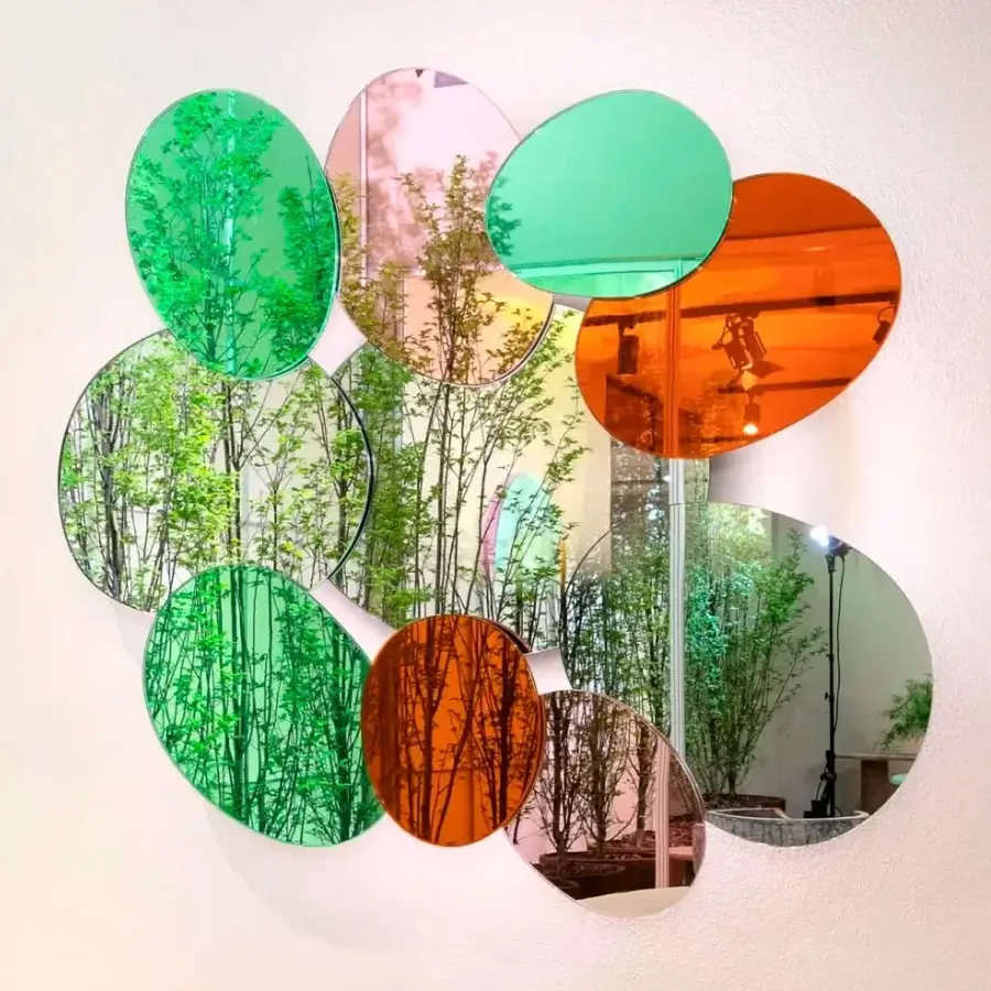 Exceptional Glas Italia Bouquet mirror with ten irregular ovoid forms in green, orange, and pale pinkish-purple glossy glass crafted in Italy