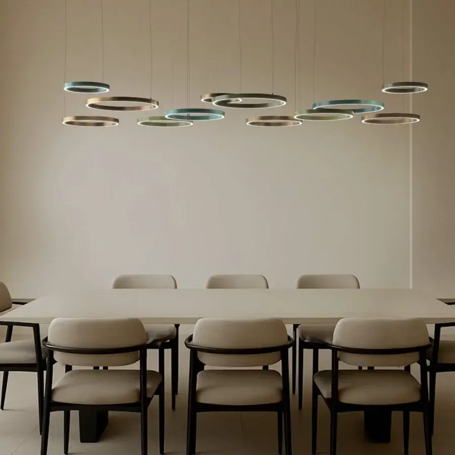 Superior Euroluce Henos suspension lamp crafted in metal with satin gold and teal-blue accents offering balanced illumination