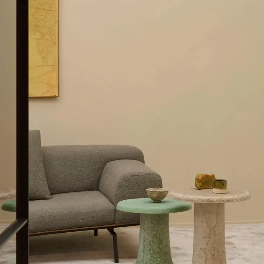Luxury Glas Italia Babar side table built with muted jade green recycled glass and organically inspired matte finish