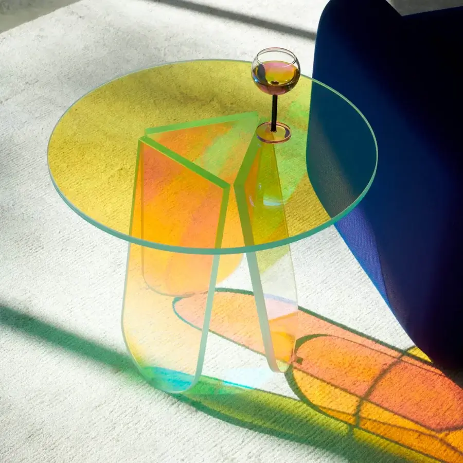Distinguished Glas Italia Shimmer side table crafted in iridescent multichromatic laminated and glued glass with a faceted pedestal base
