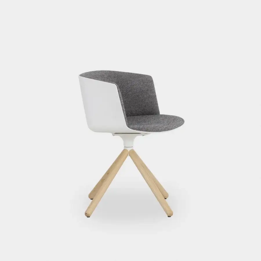 Sophisticated Lapalma Cut armchair with sculpted Baydur shell and comfortable medium gray textile upholstery with wood legs