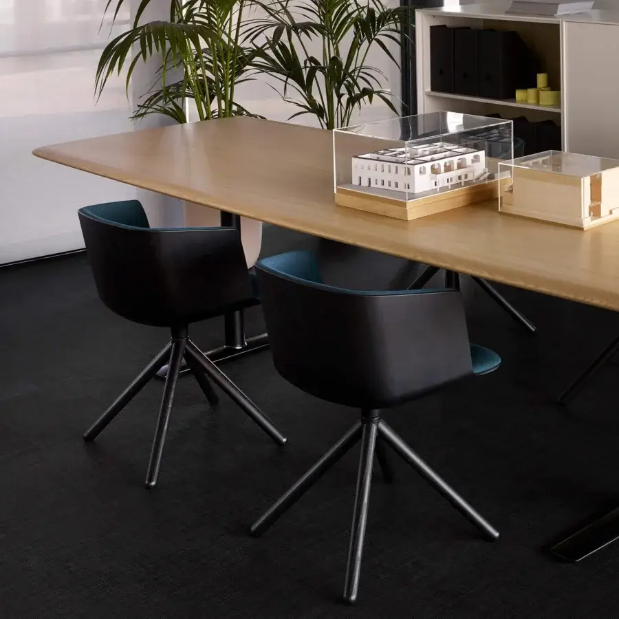 Exclusive Lapalma Cut armchair with black matte Baydur shell, teal upholstery and star-shaped metal base