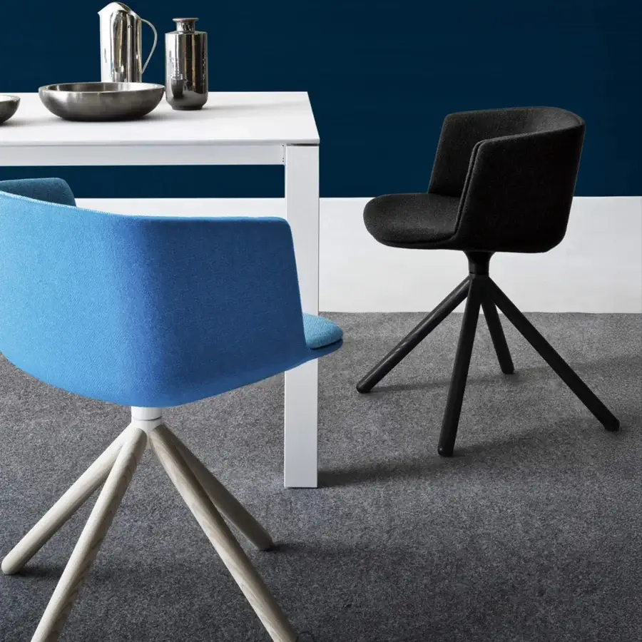 Distinguished Lapalma Cut armchair with vibrant blue textile upholstery and splayed light-colored wood legs crafted in Baydur structure