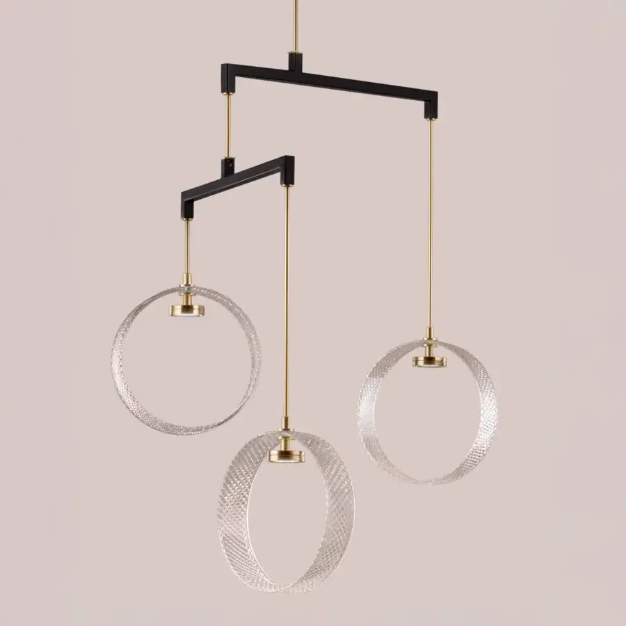 Elegant Euroluce Sospeso suspension lamp in clear glass and dark-toned steel with a matte black metal frame and gold-toned wire accents