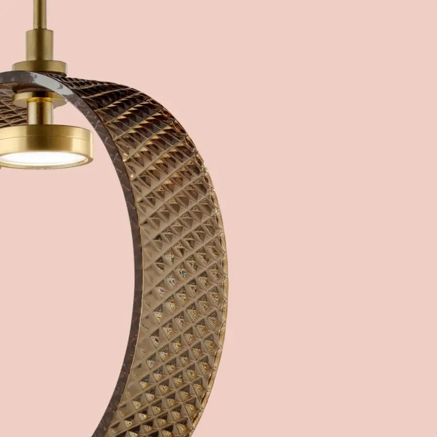 Exceptional Euroluce Sospeso suspension lamp in gold with a textured ring surrounding a bright white light source