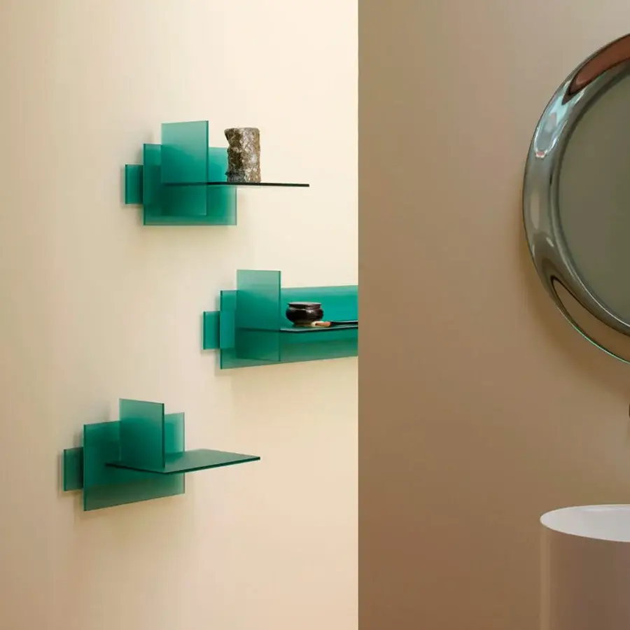 Distinguished Glas Italia Kazimir shelf crafted in teal acrylic with double-sided acid-etched tempered glass supports a minimalist form