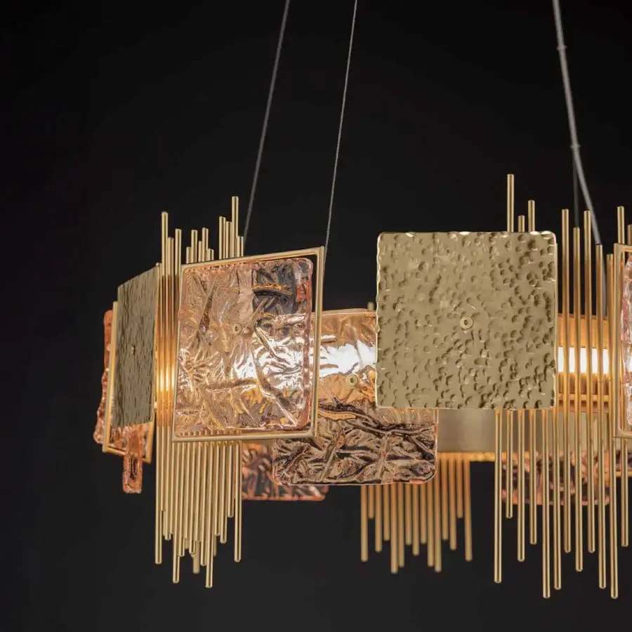 Exceptional Euroluce Character suspension lamp crafted with textured glass and gold finish, displaying a unique fringe of slender metal rods