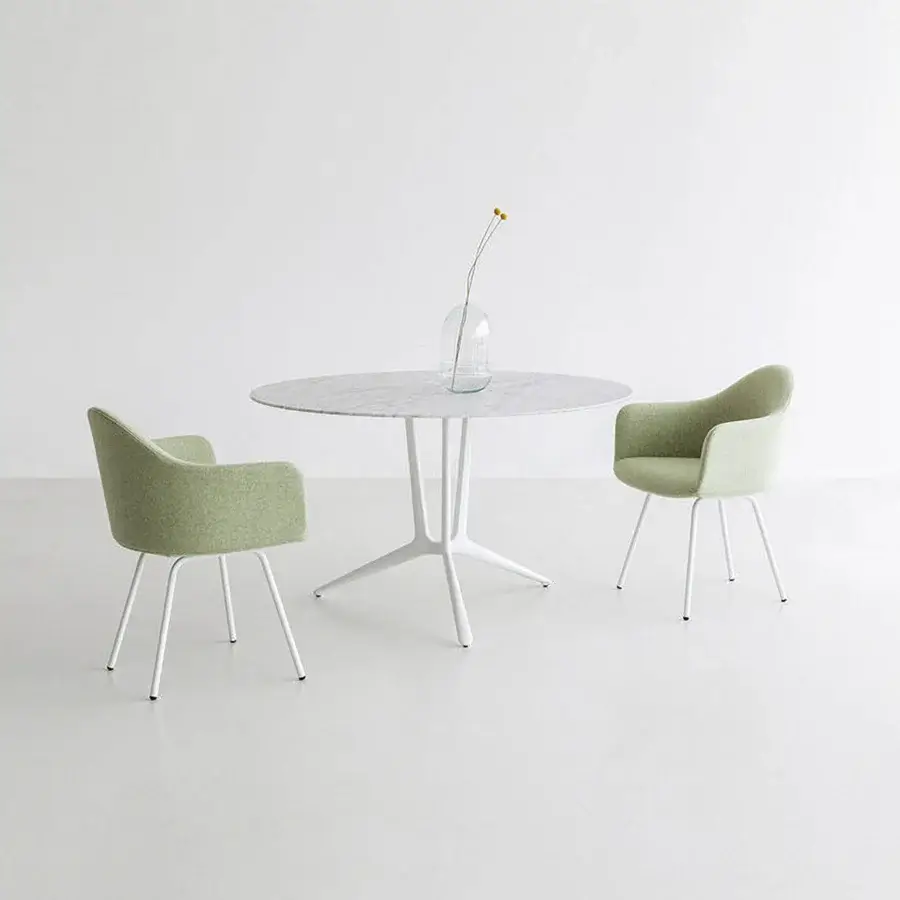 Exceptional Lapalma Edit armchair with rounded form upholstered in light green fabric and matte steel legs