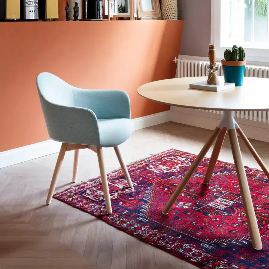 Distinguished Lapalma Edit armchair with gently curved form upholstered in muted teal fabric and varnished solid ash legs