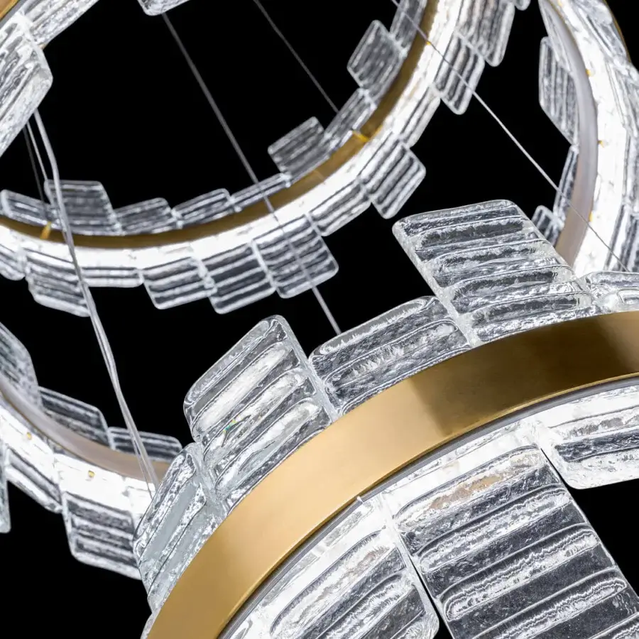 Lavish Euroluce Focus suspension lamp crafted in Italy with concentric satin gold-toned metal and textured clear glass blocks