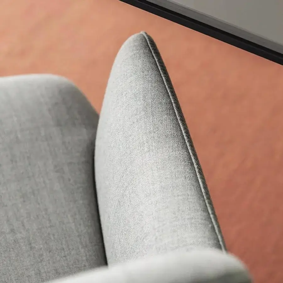 Superior Lapalma Foil armchair upholstered in textured light gray fabric with a solid ash wood base