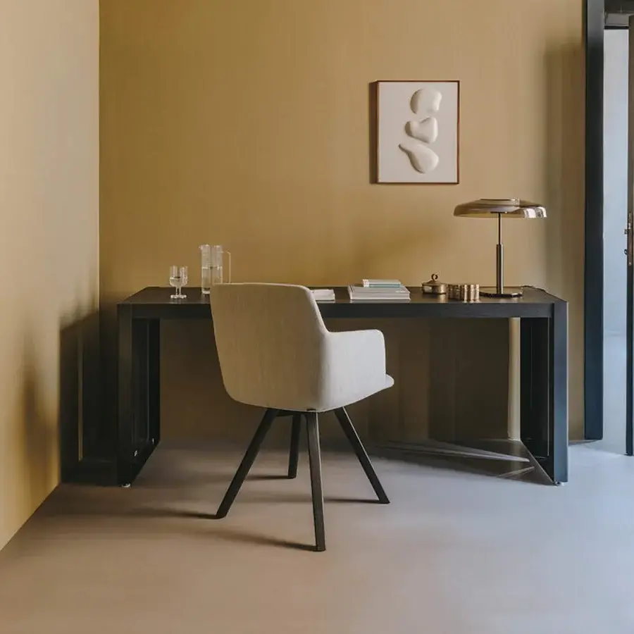 Elegant Lapalma Foil armchair upholstered in neutral beige textile with a matte dark powder-coated steel base