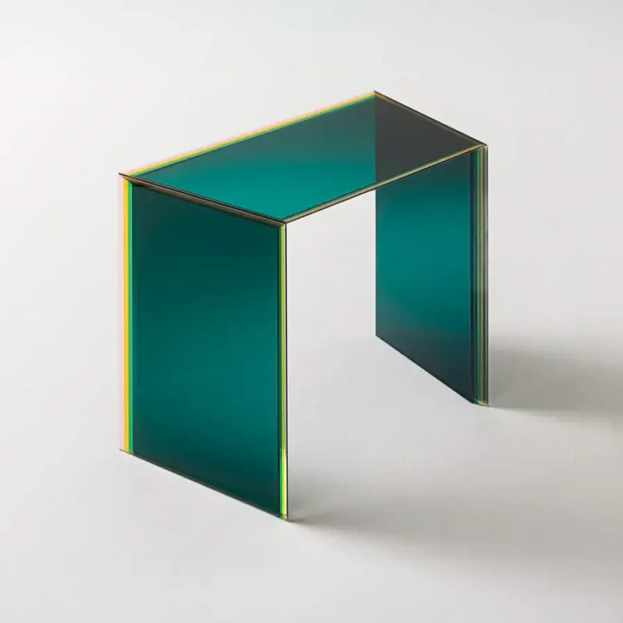 Distinguished Glas Italia Bisel table crafted from five layers of teal multichromatic glass with iridescent sheen and seamless construction