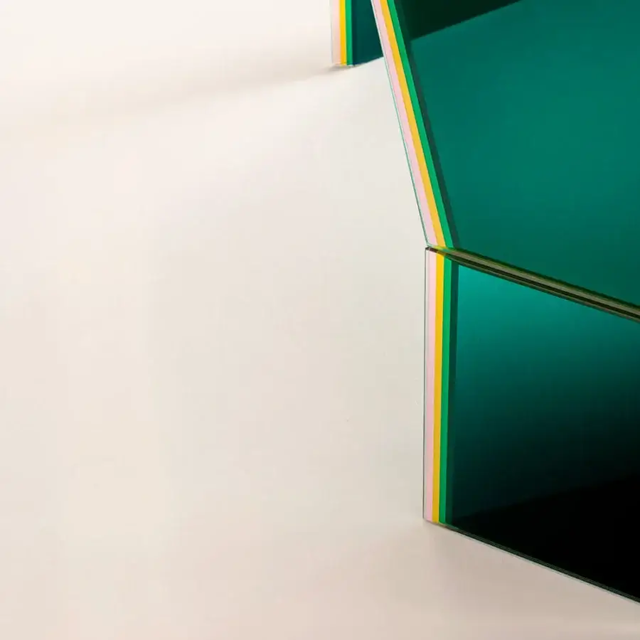 Distinguished Glas Italia Bisel table crafted from five layers of teal multichromatic glass with vibrant layered edges and glossy finish
