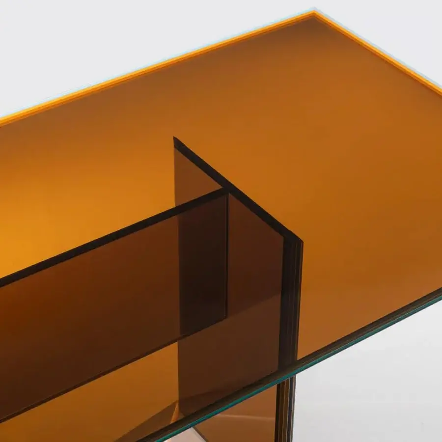 Exceptional Glas Italia Bisel table crafted from five layers of warm amber-toned extralight glass with beveled polished surfaces
