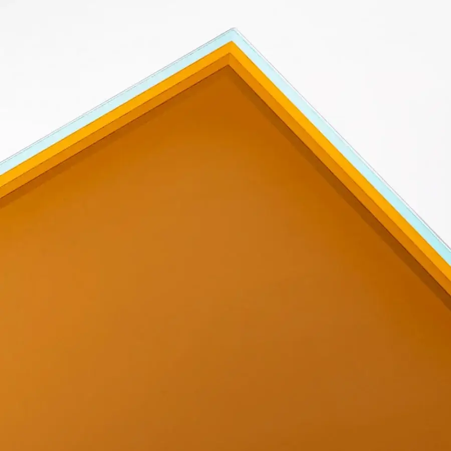 Captivating Glas Italia Bisel table built with five slabs of extralight, multichromatic glass in orange, blue, and golden-yellow tones with faceted edges