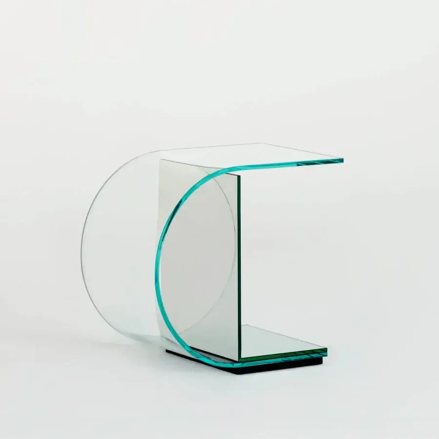 Elegant Glas Italia Ollie side table with extralight glass and a dark green mirrored base exhibiting a polished finish