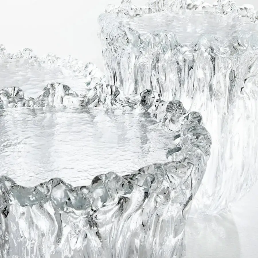 Captivating Glas Italia Fountain Murano table sculpted in colorless transparent poured glass with undulating form