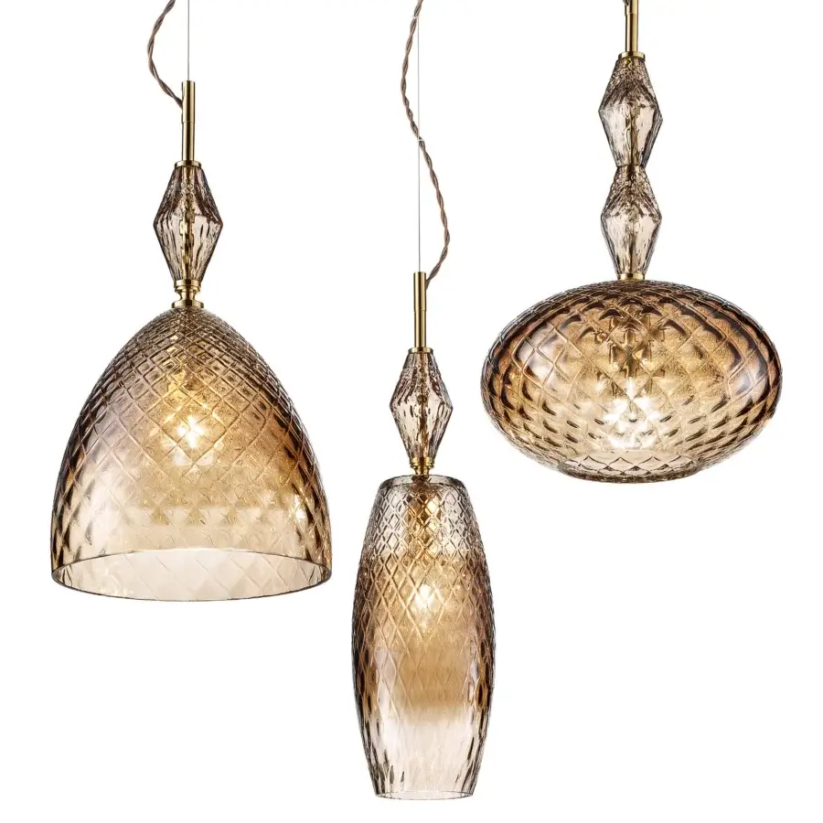 Distinguished Euroluce Mood suspension lamp crafted in warm amber hand-blown glass with a delicate diamond texture and brass-colored stem