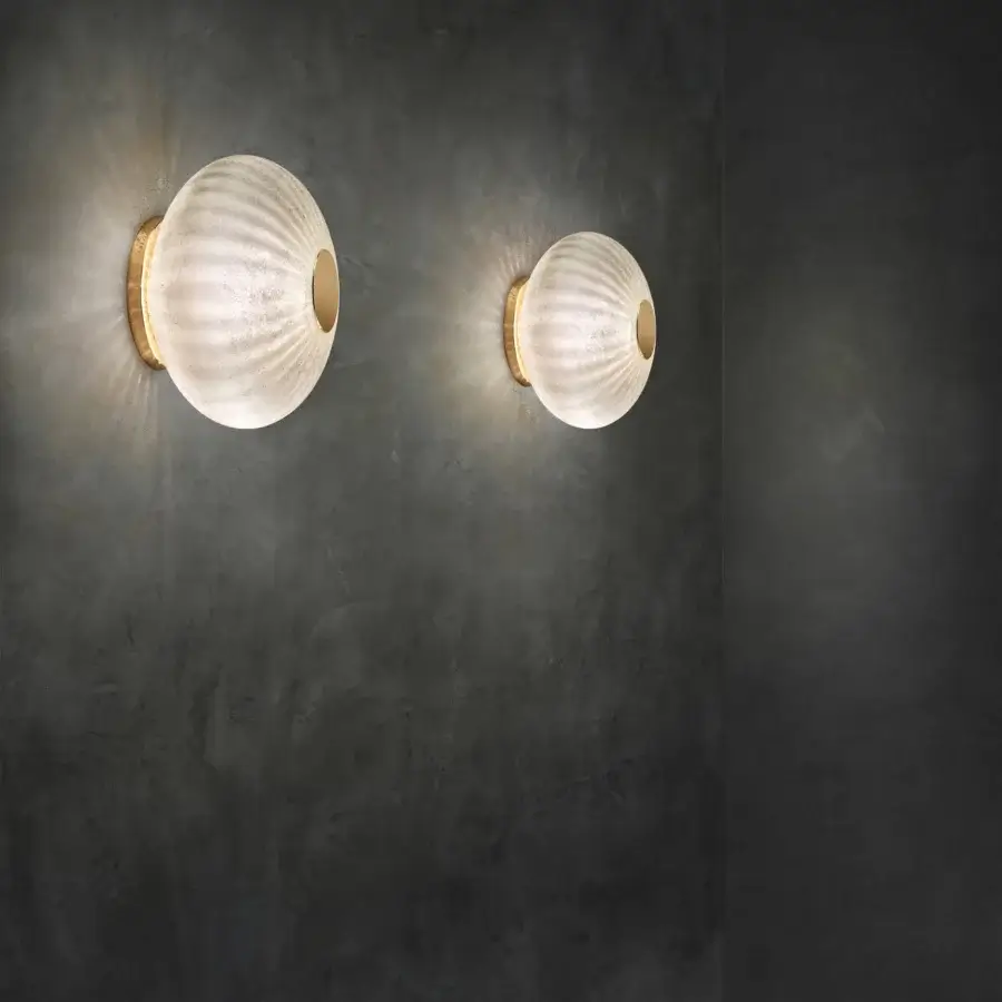 Distinguished Euroluce Moonlight wall lamp crafted in frosted glass with a warm golden tone and unique vintage finish