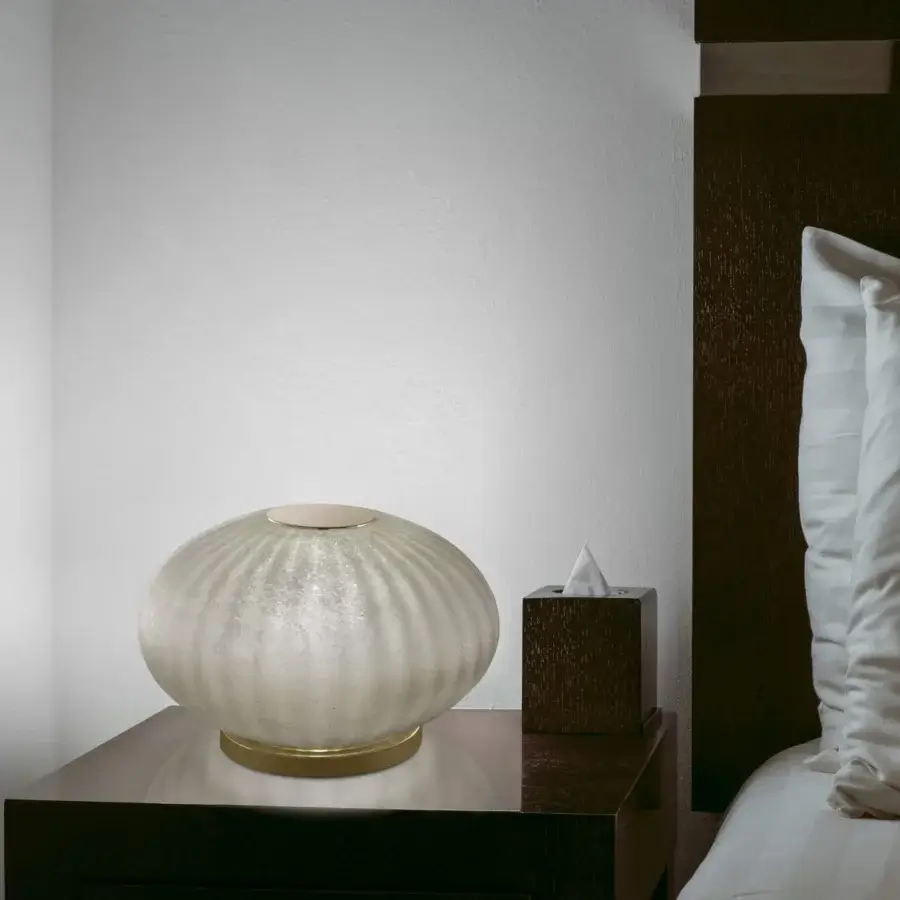 Distinguished Euroluce Moonlight lamp crafted in pale beige textured glass with vintage powder deposition and a warm golden metal base