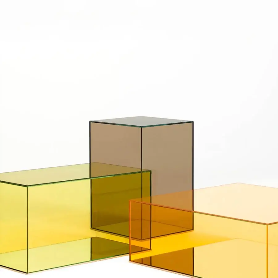 Distinguished Glas Italia Donald table crafted in laminated transparent glass with yellow, orange, and brown hues plus mirrored stainless steel base