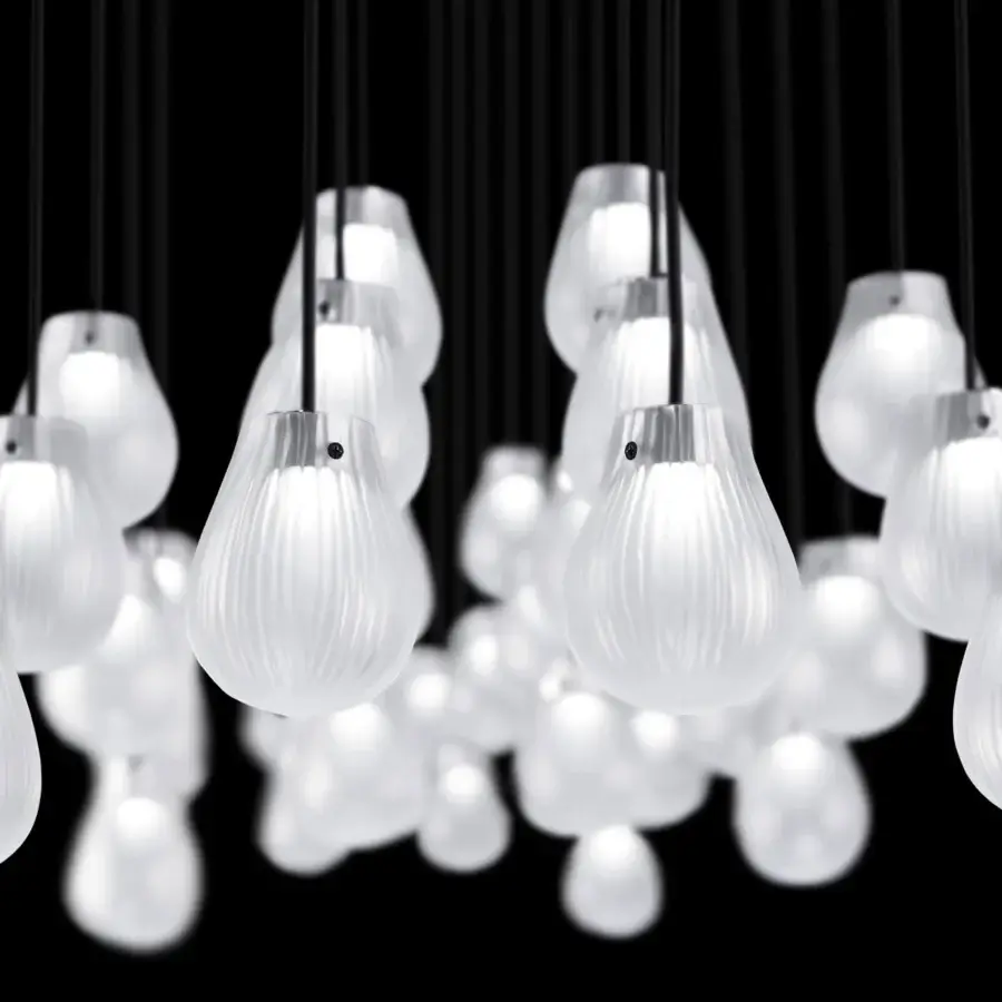 Exceptional Euroluce Gocce suspension lamp with pear-shaped ribbed glass shades and slender dark metal rods crafted in Italy