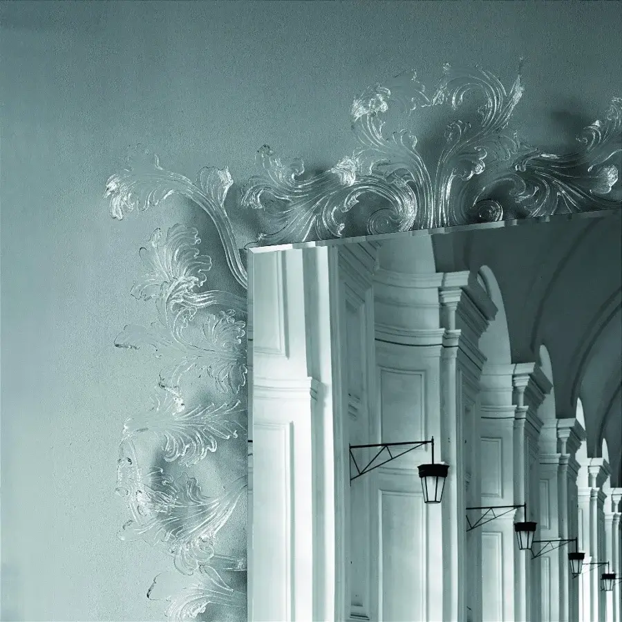 Captivating Glas Italia Sturm und Drang mirror crafted with swirling baroque-inspired patterns in hand-made colorless Murano glass and chamfered finish