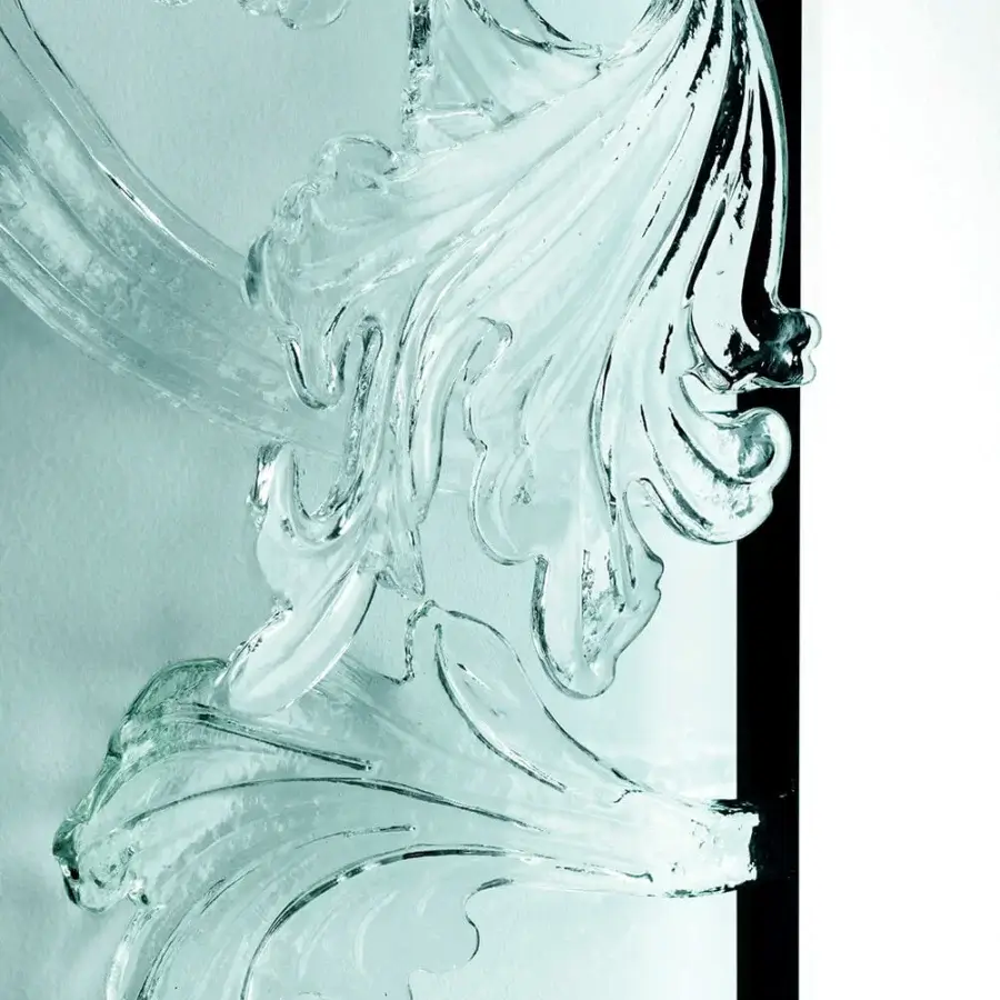 Distinguished Glas Italia Sturm und Drang mirror crafted in hand-made Murano glass with pale blue-green tint and ornate sculptural finish