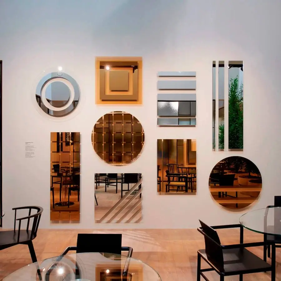 Distinguished Glas Italia Andromeda mirror crafted from glass with a warm golden-yellow wood frame and transparent surfaces