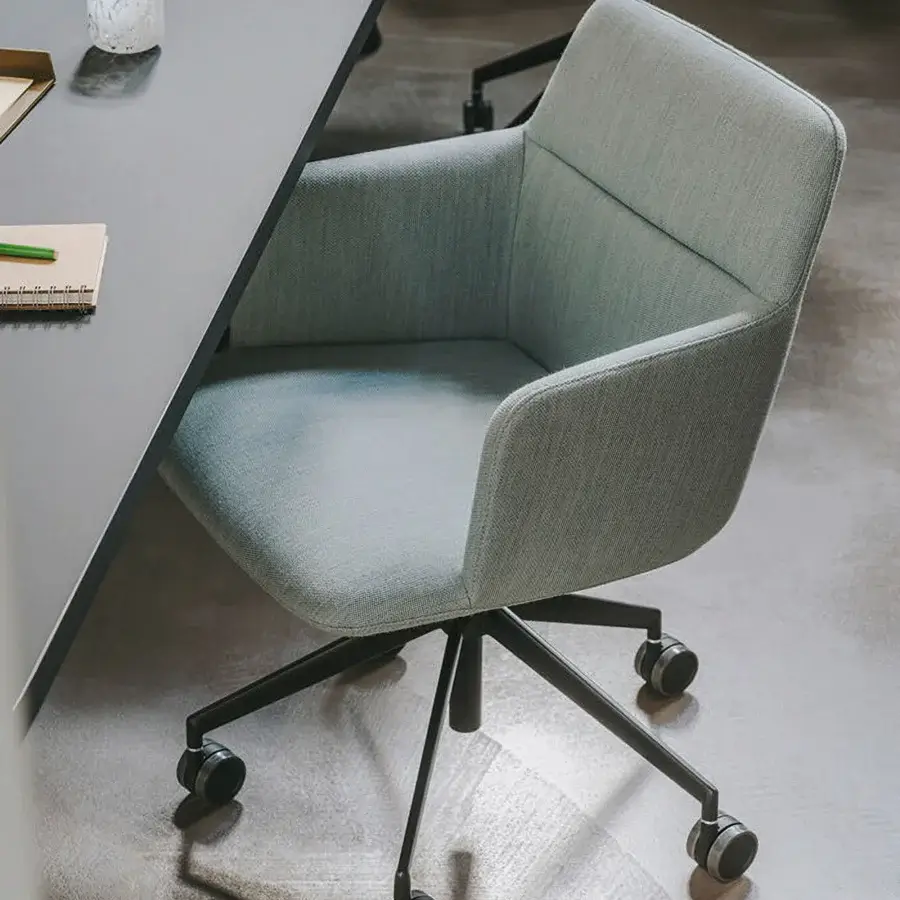 Elegant Lapalma Foil office armchair upholstered in light grey-green fabric with dark grey powder-coated aluminium swivel base