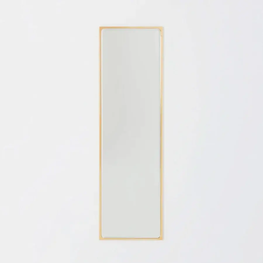 Superior Glas Italia Como mirror in shiny-polished untreated solid brass exhibiting a beveled perimeter with rounded corners