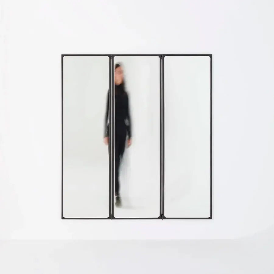 Exceptional Glas Italia Como mirror built in shiny-polished untreated solid brass with dark gray matte finish and rotating panels