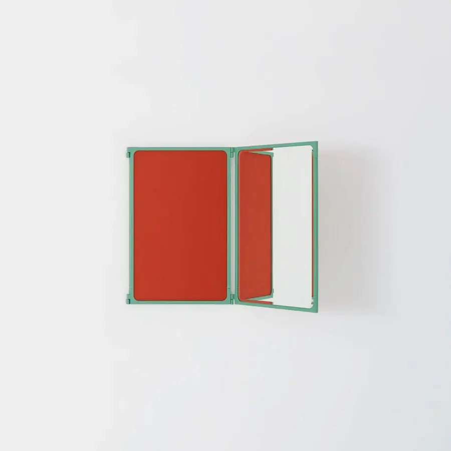 Exceptional Glas Italia Como mirror crafted in lacquered brass with a seafoam green finish and rotating bi-fold design