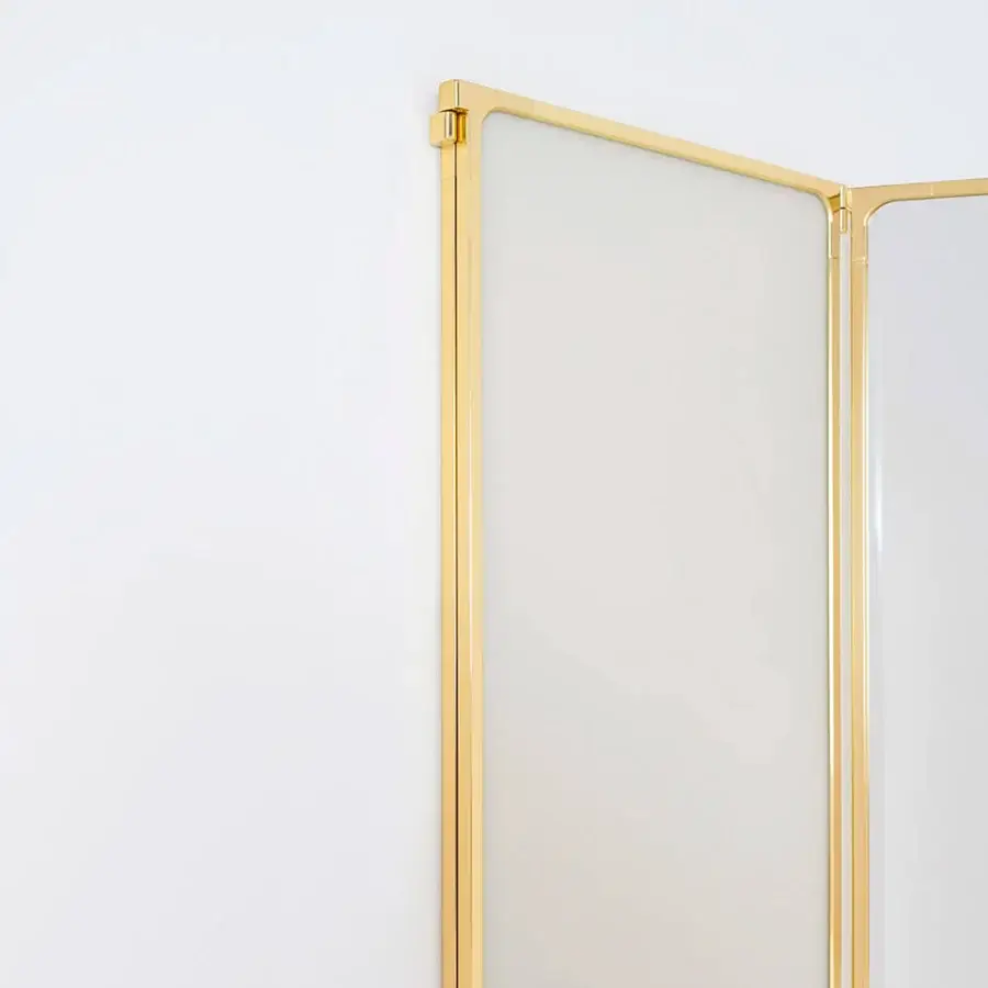 Lavish Glas Italia Como mirror built in shiny-polished untreated solid brass with rotating panels revealing matt lacquered glass backing