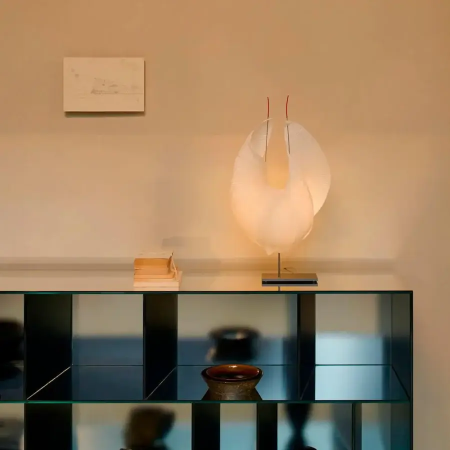 Distinguished Glas Italia Obliquo sideboard built from laminated glass with a shiny polished edge and special mirrored teal finish