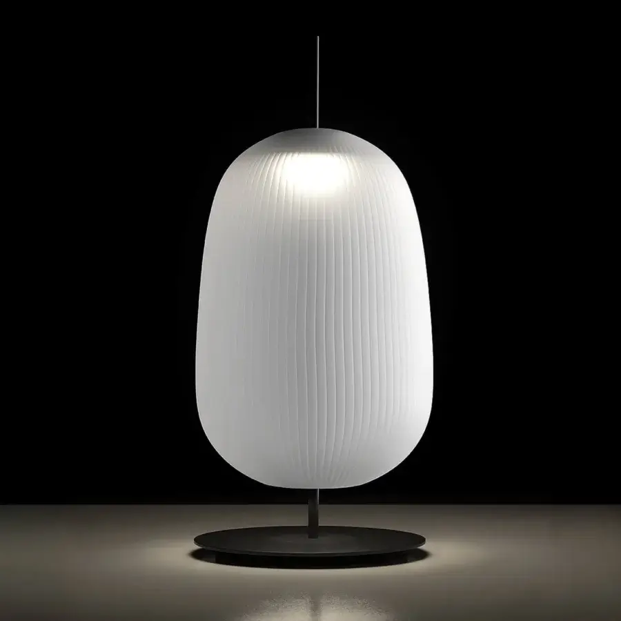 Distinguished melogranoblu Maat table lamp crafted in hand-blown glass with a white frosted shade and dark matte metal base