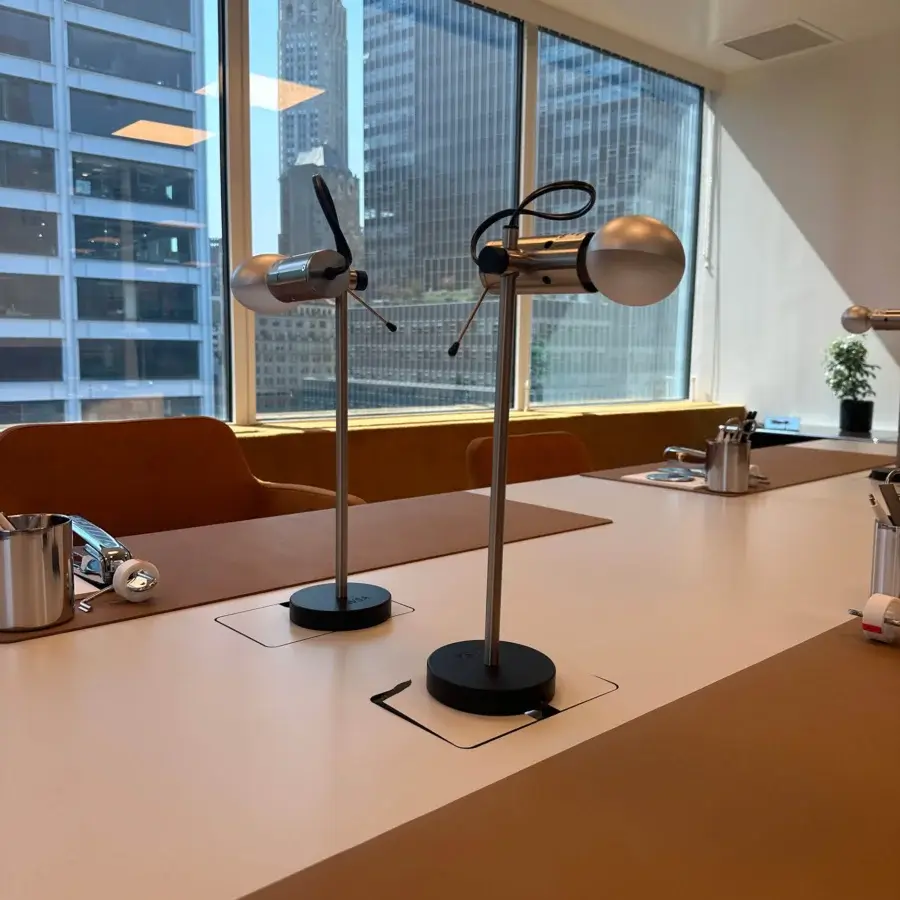 Distinguished Oluce Agnoli table lamp crafted in Italy with a satin metal finish and bright white spherical shade